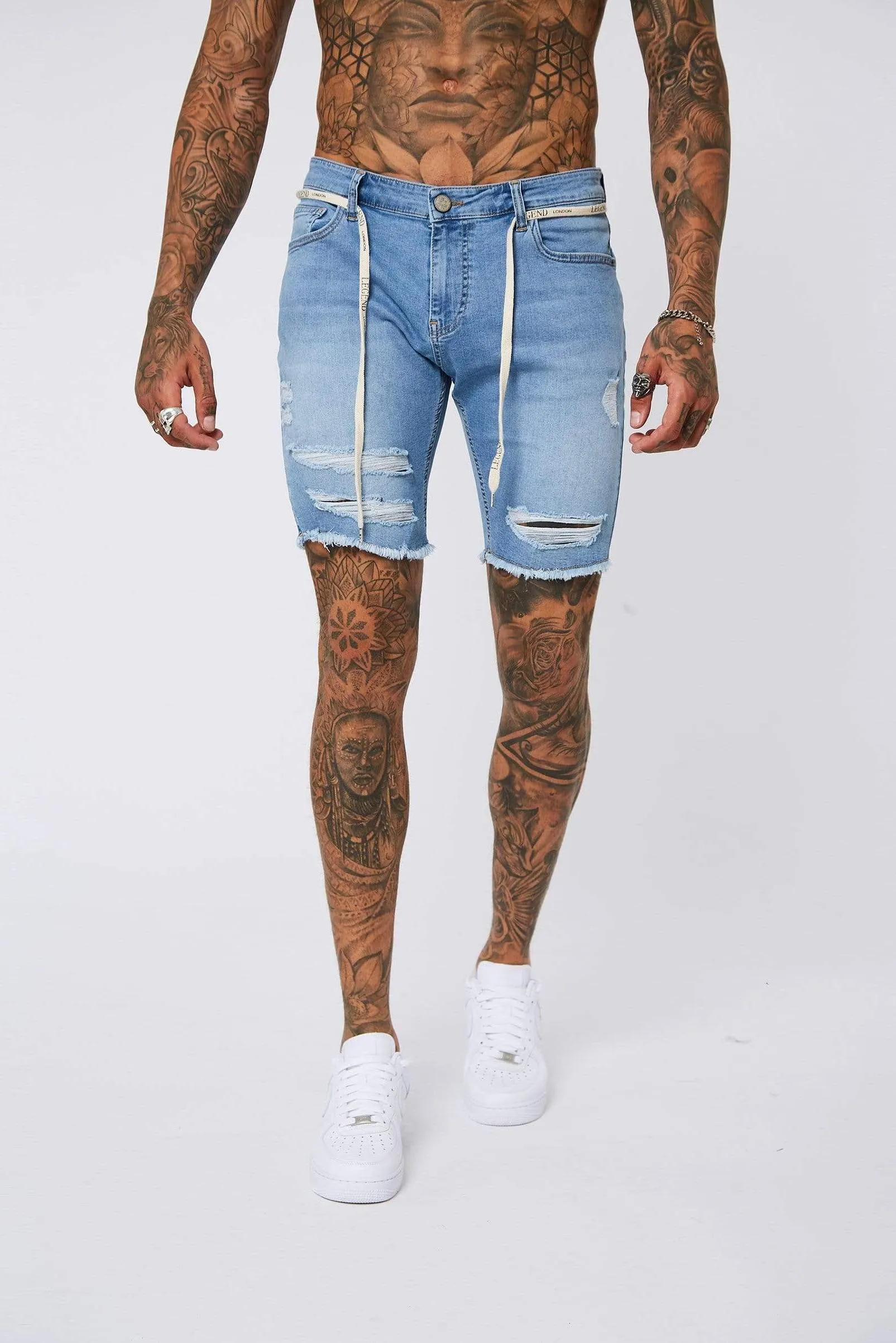 Light Blue Denim Shorts - Ripped & Repaired