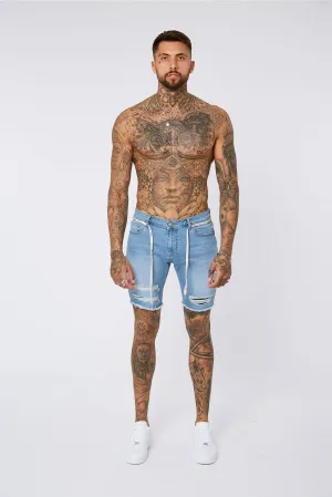 Light Blue Denim Shorts - Ripped & Repaired