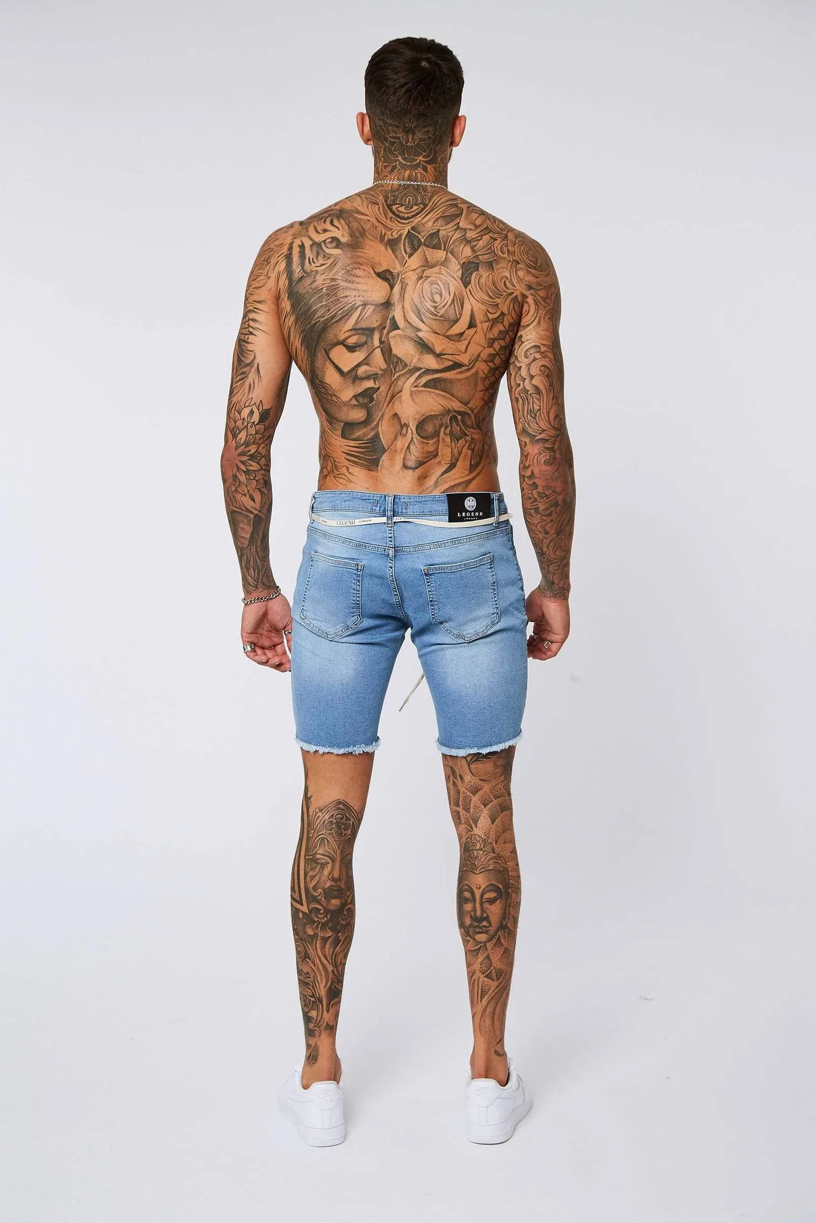 Light Blue Denim Shorts - Ripped & Repaired