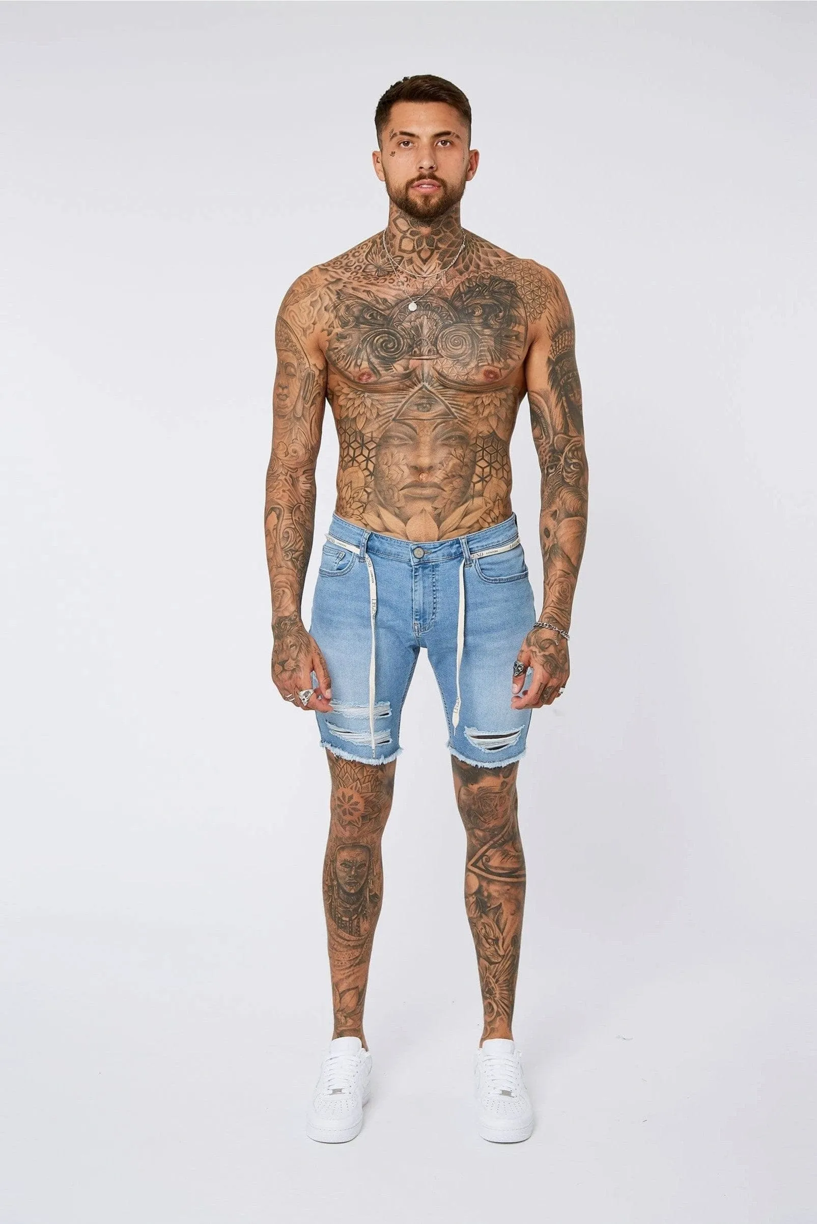 Light Blue Denim Shorts - Ripped & Repaired