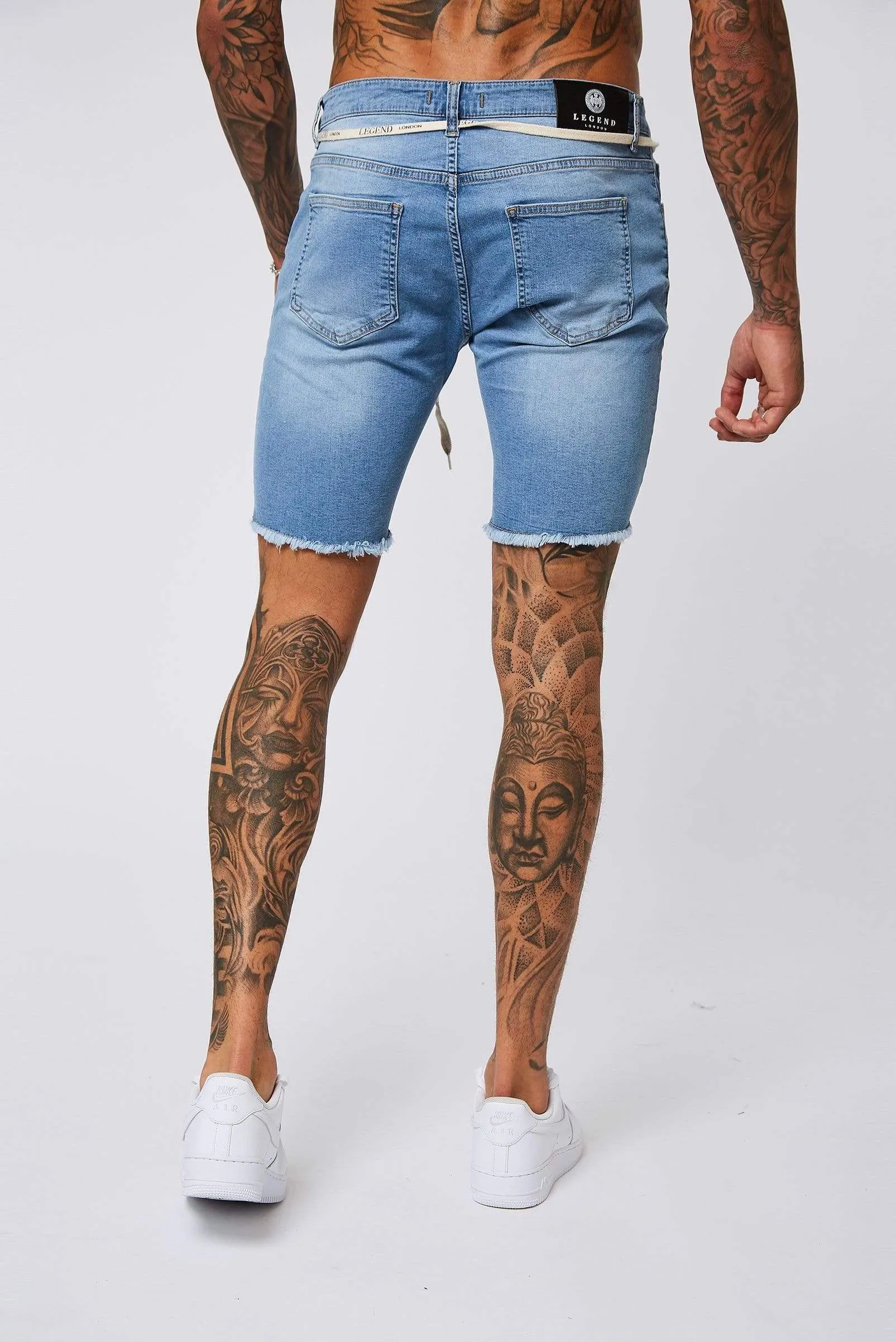 Light Blue Denim Shorts - Ripped & Repaired