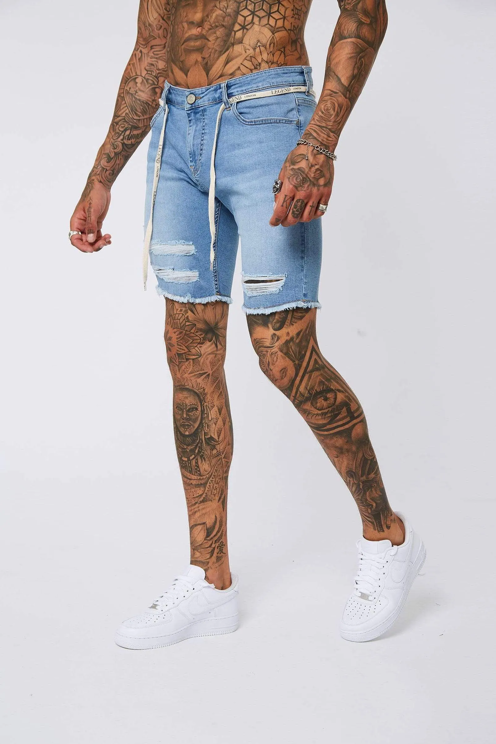 Light Blue Denim Shorts - Ripped & Repaired