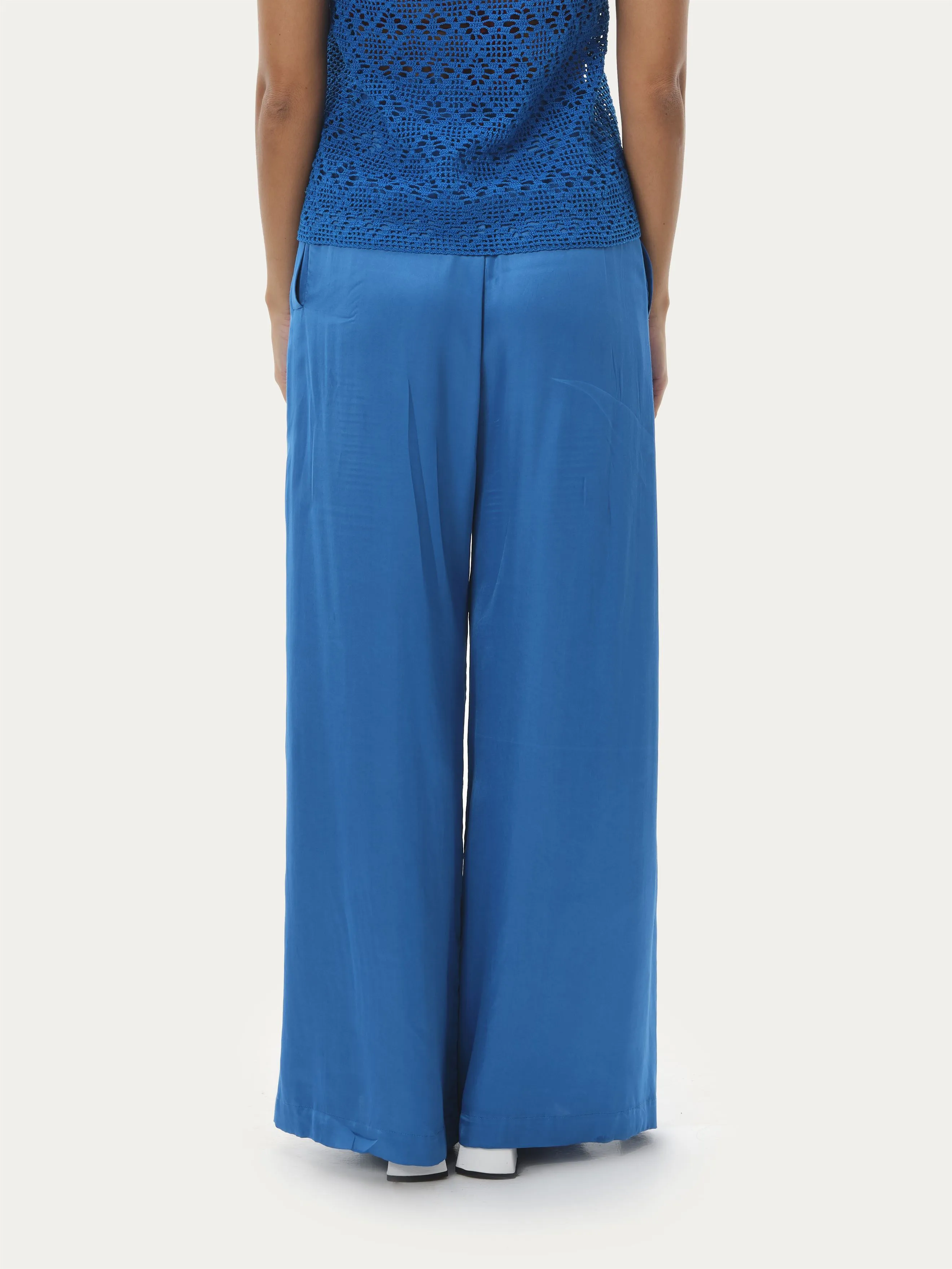 Naushad Ali   I   Box-pleated pants Ramar blue Signature Spring Summer 2025 Ramar blue Cotton satin NA SS24 W35P