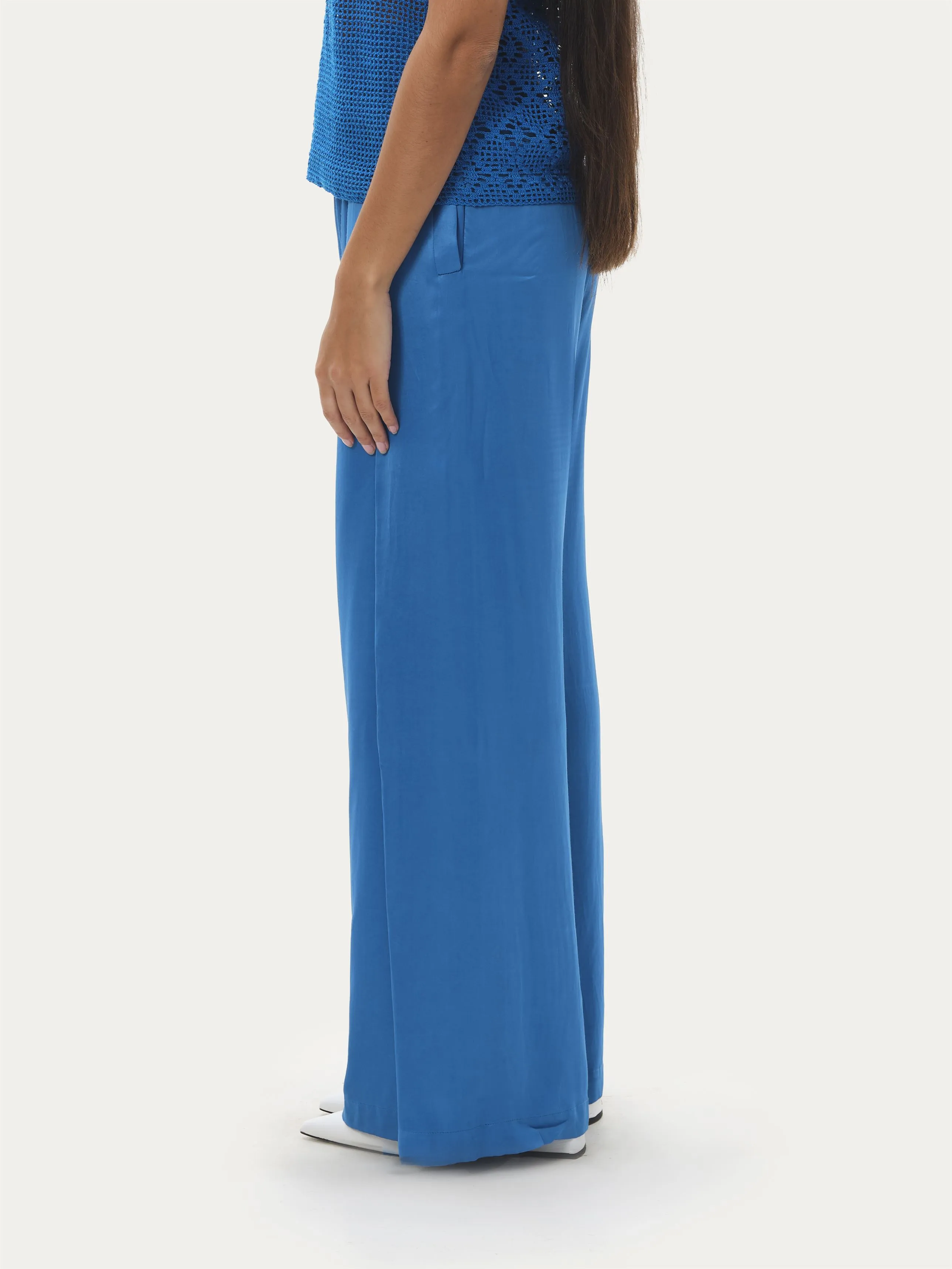 Naushad Ali   I   Box-pleated pants Ramar blue Signature Spring Summer 2025 Ramar blue Cotton satin NA SS24 W35P