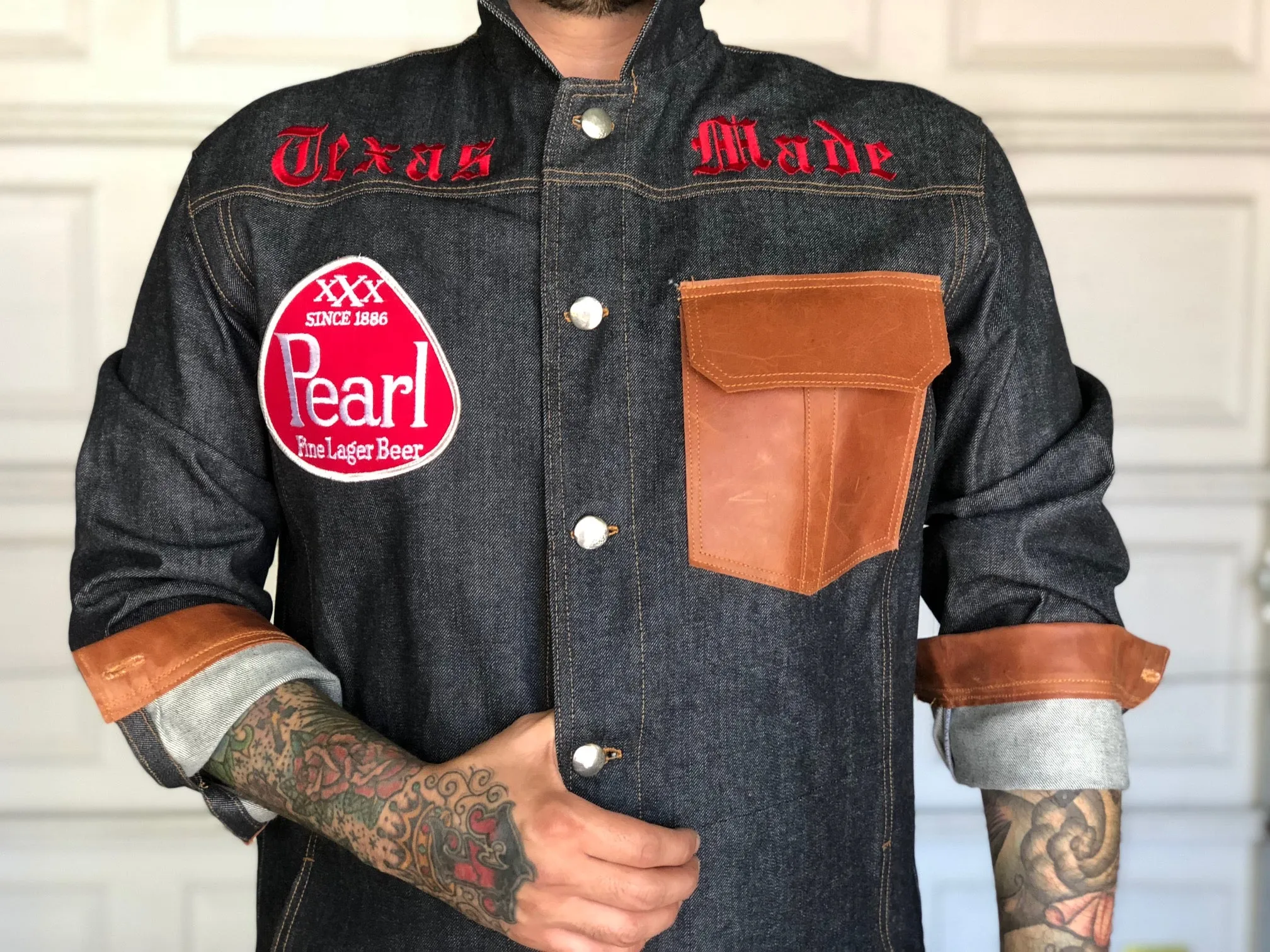 "Texas Made" denim and cognac leather jacket