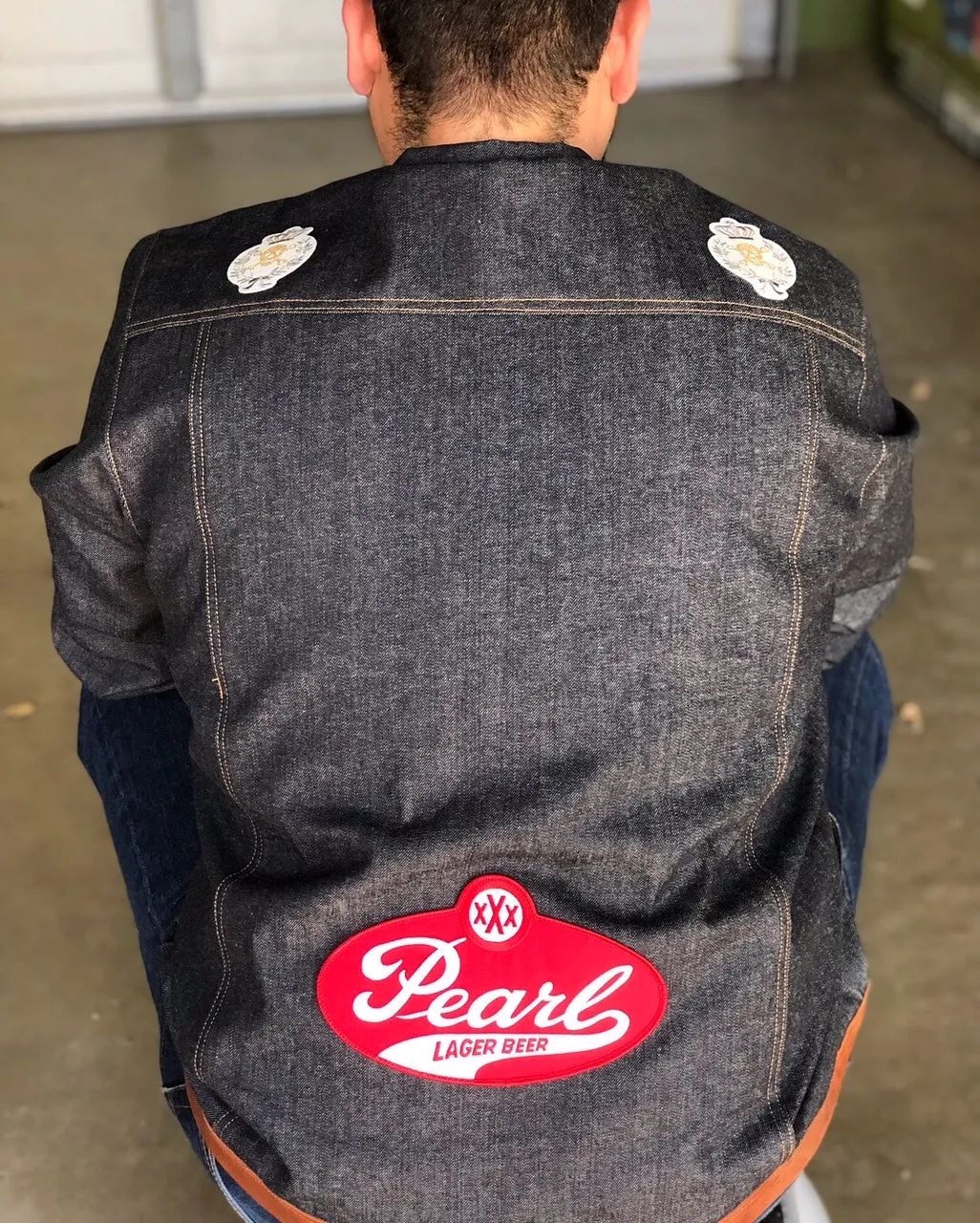 "Texas Made" denim and cognac leather jacket