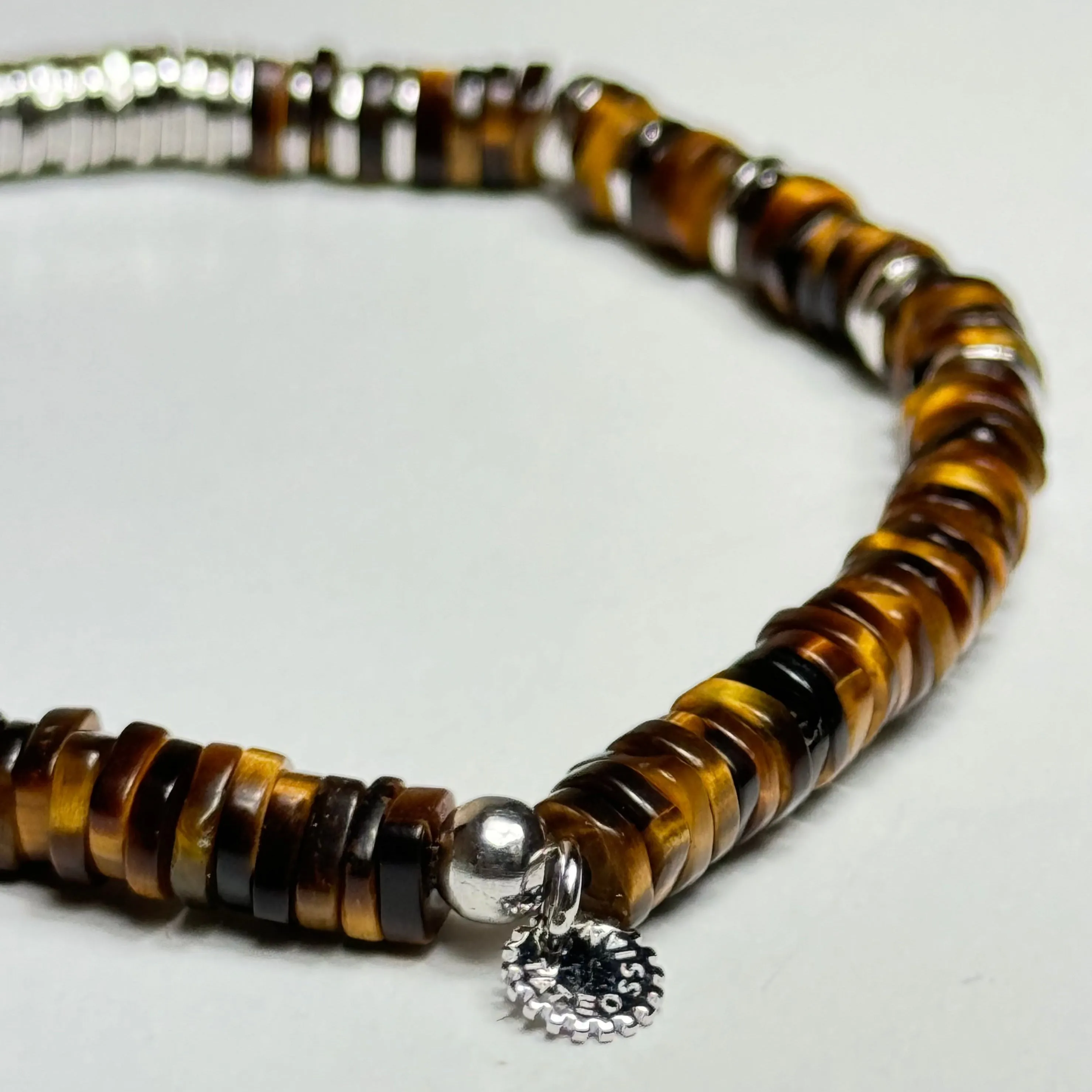 Tiger eye, palm and ebony wood with rose gold plated sterling silve